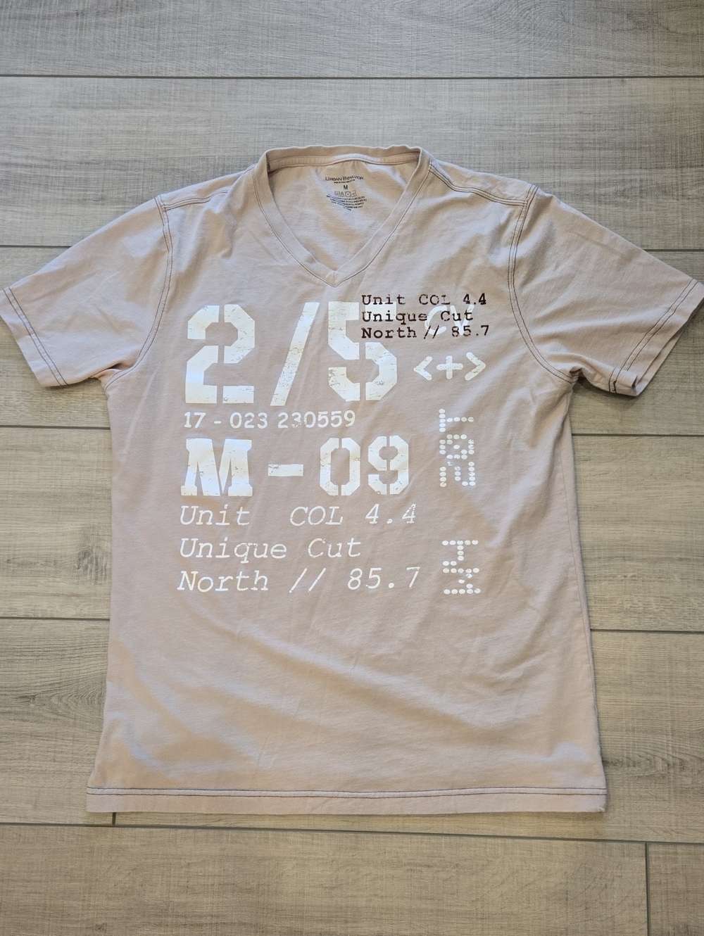 Urban Behavior Short Sleeve V-Neck Tee in Light Taupe with White Graphic